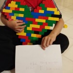 A heart shaped Lego and a little sign that said, "The thing that (??)  I love you